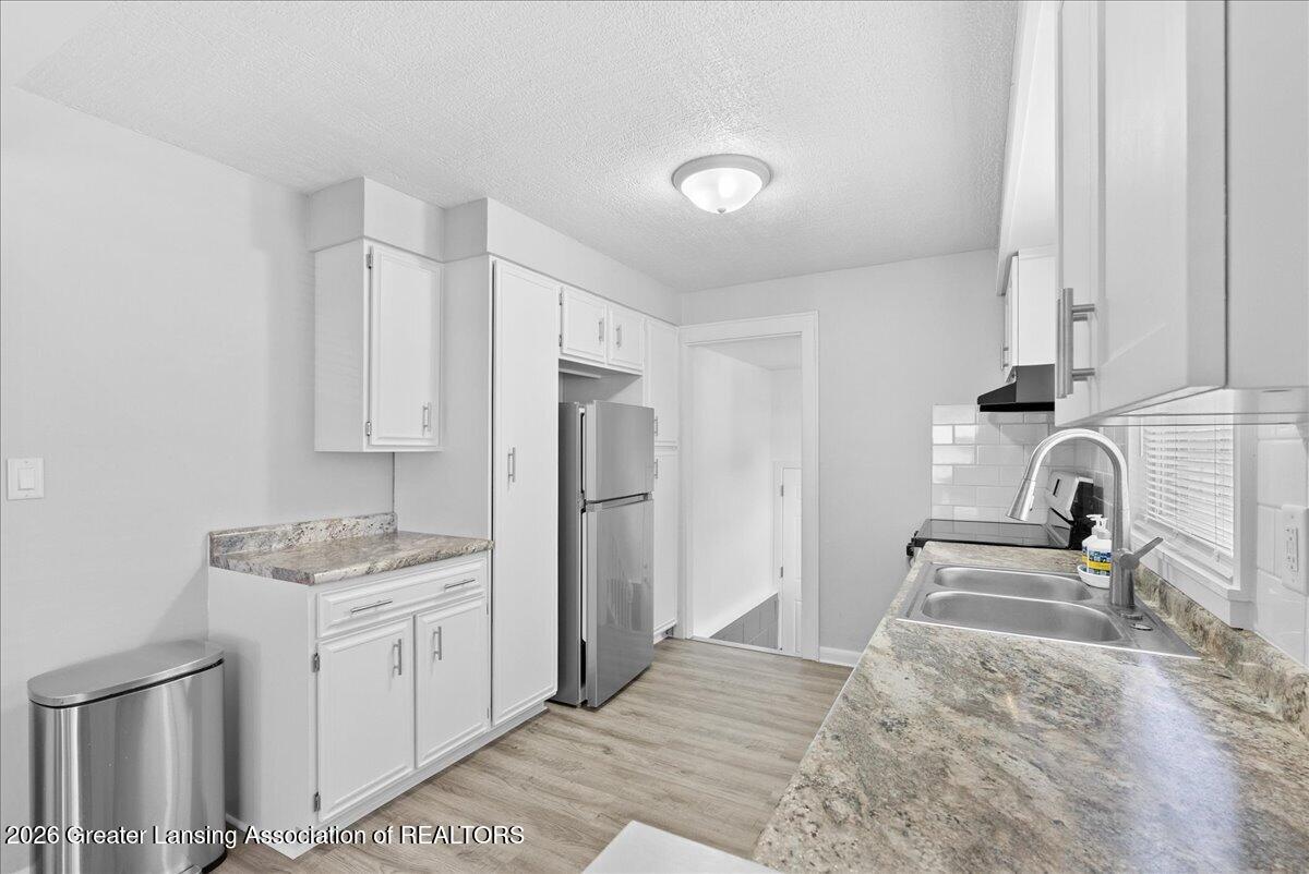 6041 Hilliard Road Lansing, MI 48911 - Photo 8 of 26 17-Media Jett - 08