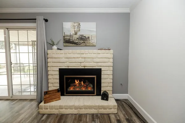 a living room with a fireplace