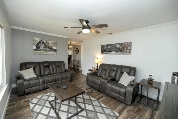 a living room with furniture and a couch