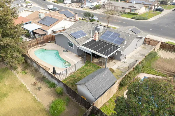 view of a pool with chairs