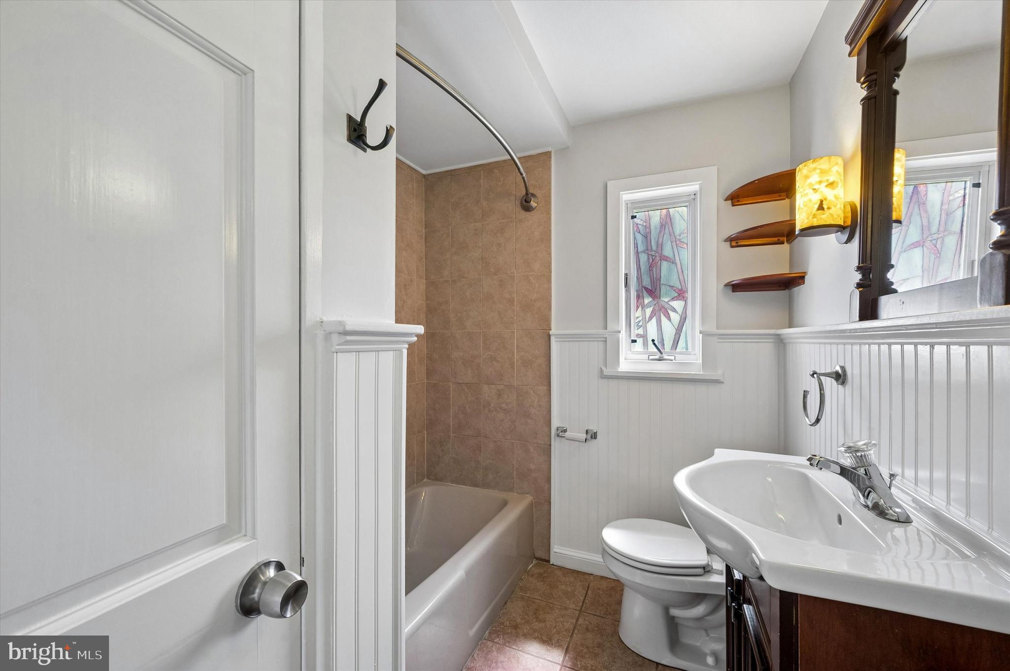 2154 Sproul Road Broomall, PA 19008 - Photo 23 of 25 a bathroom with a sink toilet and shower