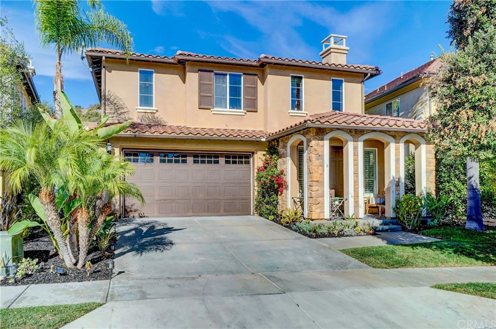 20 Paseo Canos San Clemente, CA 92673 - Photo 1 of 71 a front view of a house with a garden