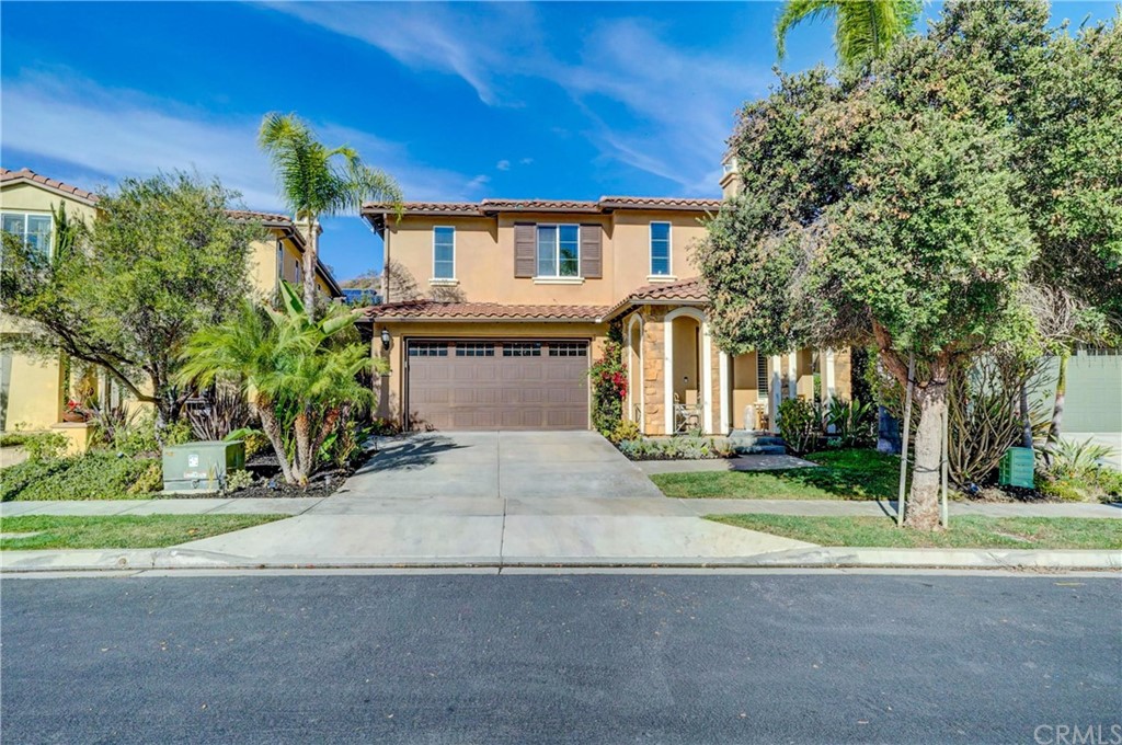 20 Paseo Canos San Clemente, CA 92673 - Photo 2 of 71 a front view of a house with a yard and garage