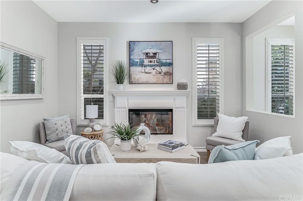 20 Paseo Canos San Clemente, CA 92673 - Photo 16 of 71 a living room with furniture and a fireplace