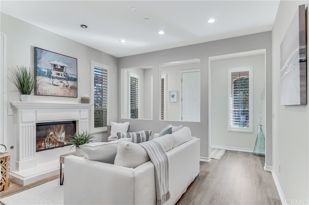 20 Paseo Canos San Clemente, CA 92673 - Photo 17 of 71 a living room with furniture and a fireplace
