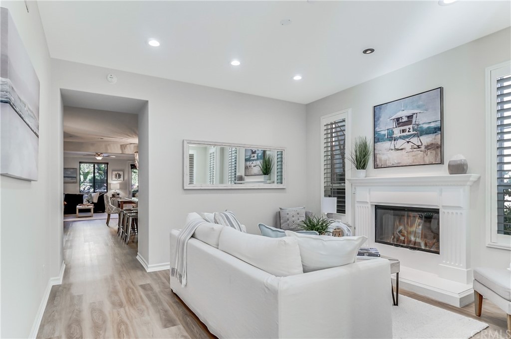 20 Paseo Canos San Clemente, CA 92673 - Photo 18 of 71 a living room with furniture and a fireplace