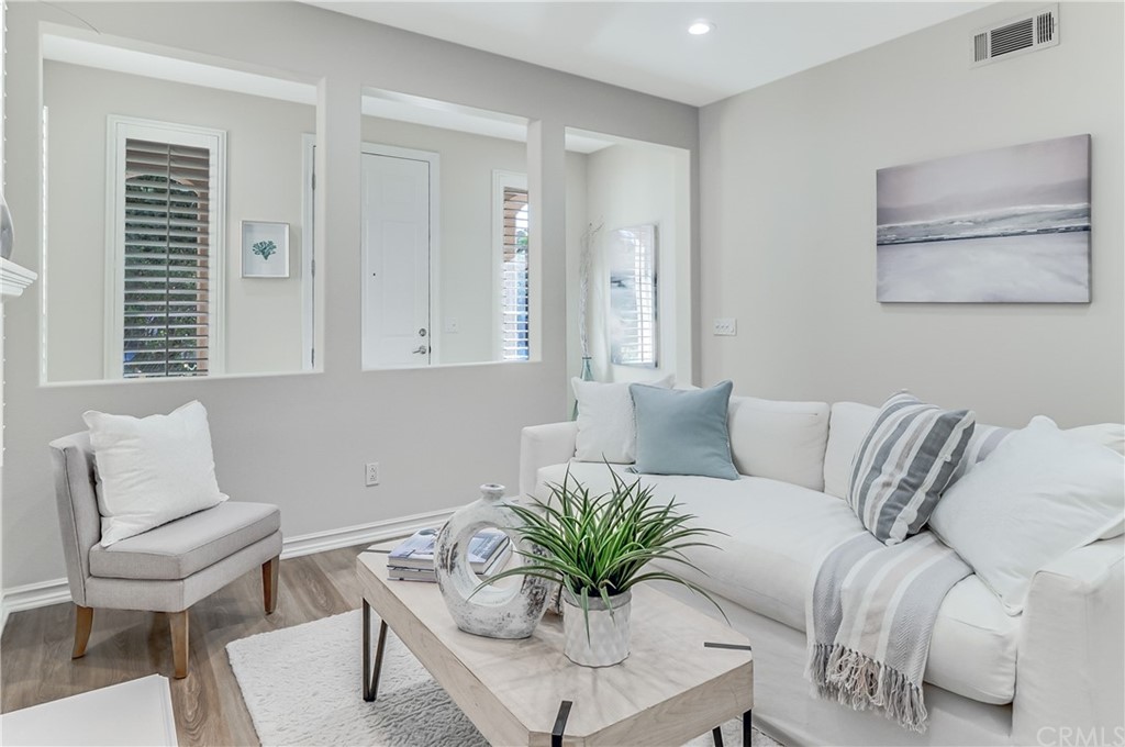 20 Paseo Canos San Clemente, CA 92673 - Photo 19 of 71 a living room with furniture and a large window