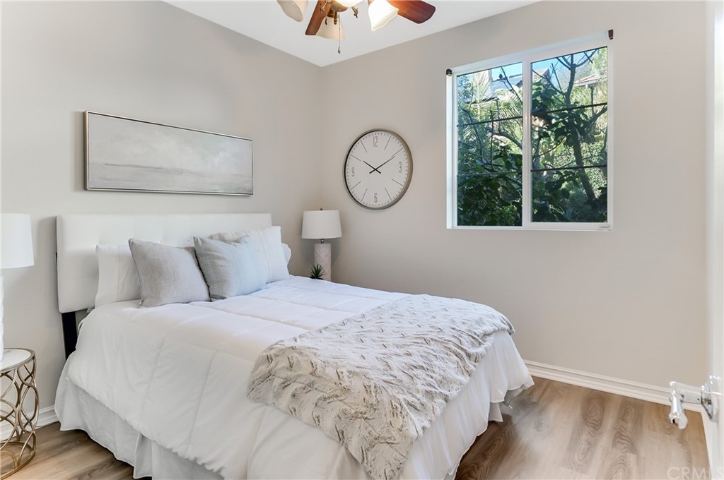 20 Paseo Canos San Clemente, CA 92673 - Photo 20 of 71 a bedroom with a bed and a window