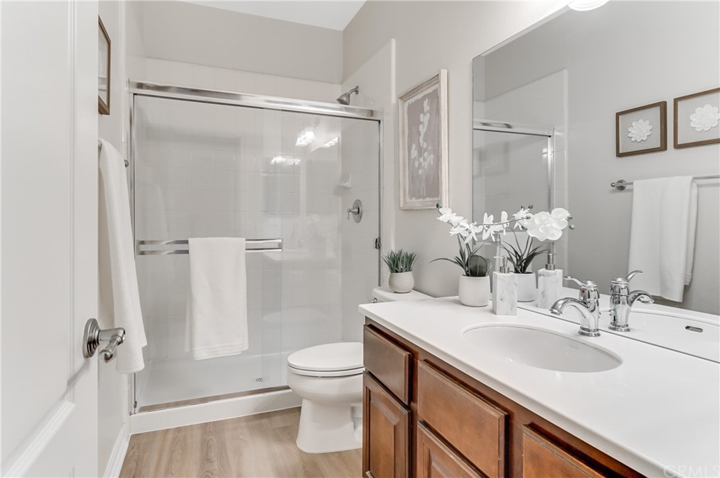 20 Paseo Canos San Clemente, CA 92673 - Photo 21 of 71 a bathroom with a sink toilet and shower