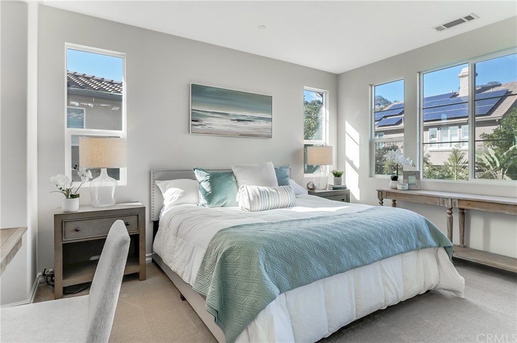 20 Paseo Canos San Clemente, CA 92673 - Photo 24 of 71 a bedroom with a large bed and a window