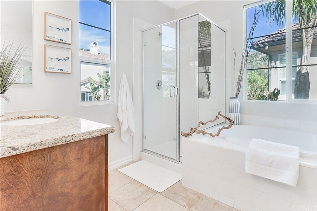 20 Paseo Canos San Clemente, CA 92673 - Photo 30 of 71 a bathroom with a granite countertop sink and a mirror