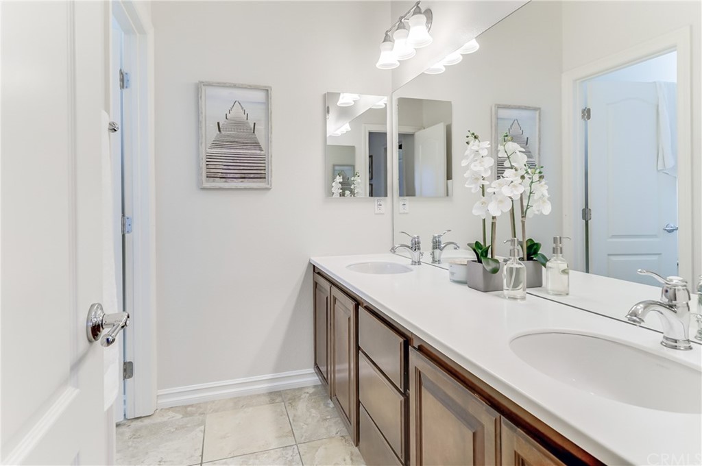20 Paseo Canos San Clemente, CA 92673 - Photo 39 of 71 a bathroom with a sink and a mirror