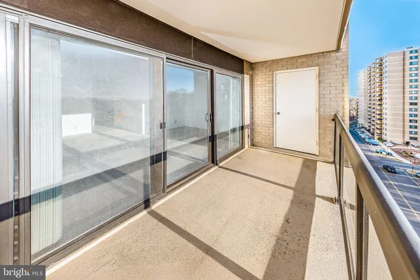 a kitchen with a white cabinets and white appliances
