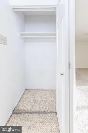 a front view of a building with street view