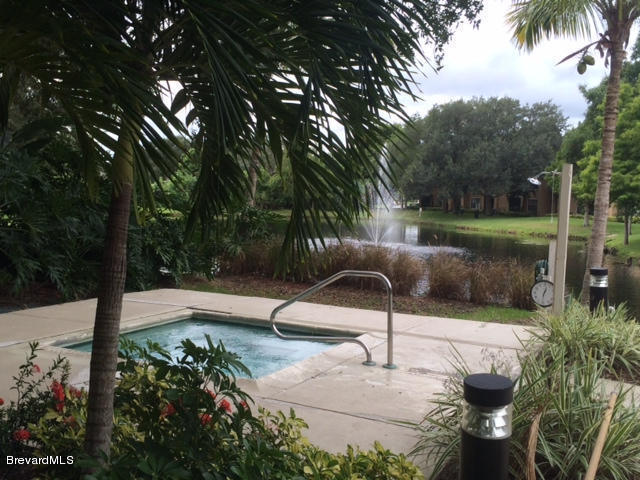 7667 North Wickham Road, Unit 401 Melbourne, FL 32940 - Photo 12 of 17 Spa and Lakeview