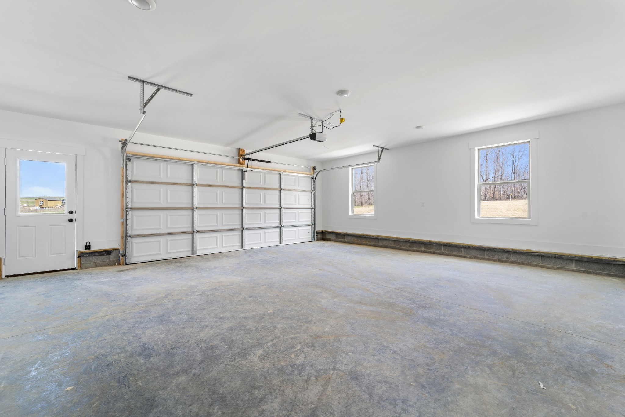 6120 Red River School Road Portland, TN 37148 - Photo 11 of 26 an empty room with windows and ceiling fan
