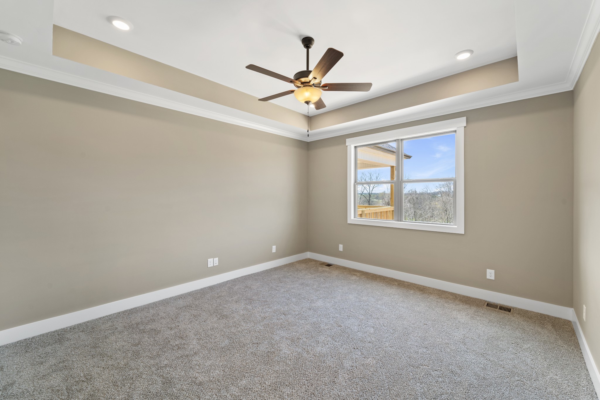 6120 Red River School Road Portland, TN 37148 - Photo 16 of 26 an empty room with windows and fan