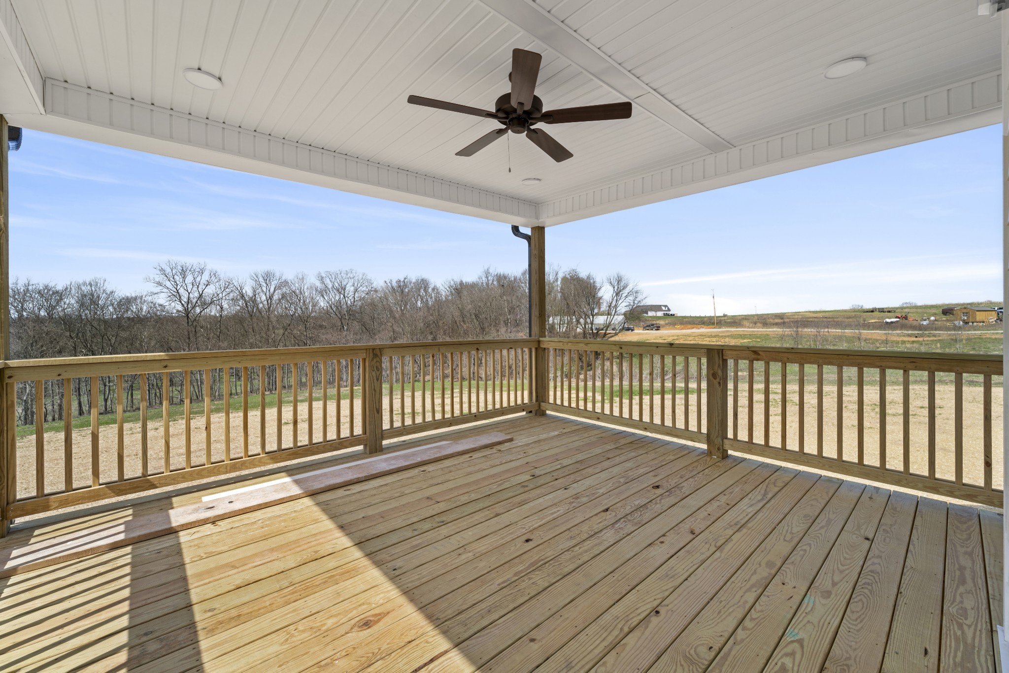 6120 Red River School Road Portland, TN 37148 - Photo 21 of 26 a view of a balcony with wooden floor