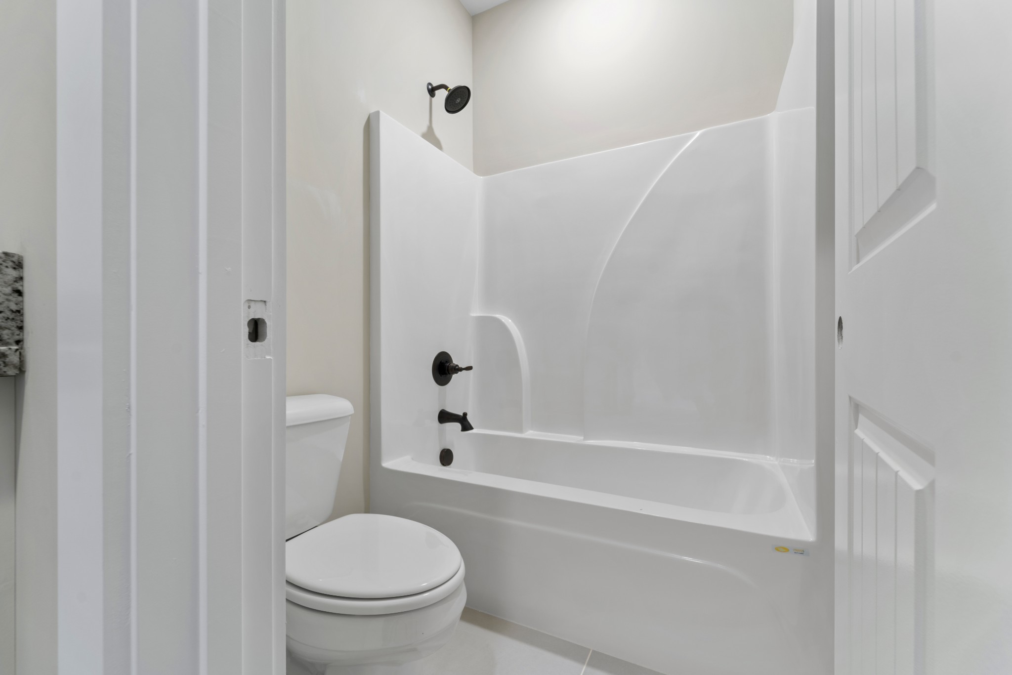 6120 Red River School Road Portland, TN 37148 - Photo 25 of 26 a bathroom with a toilet and a bathtub