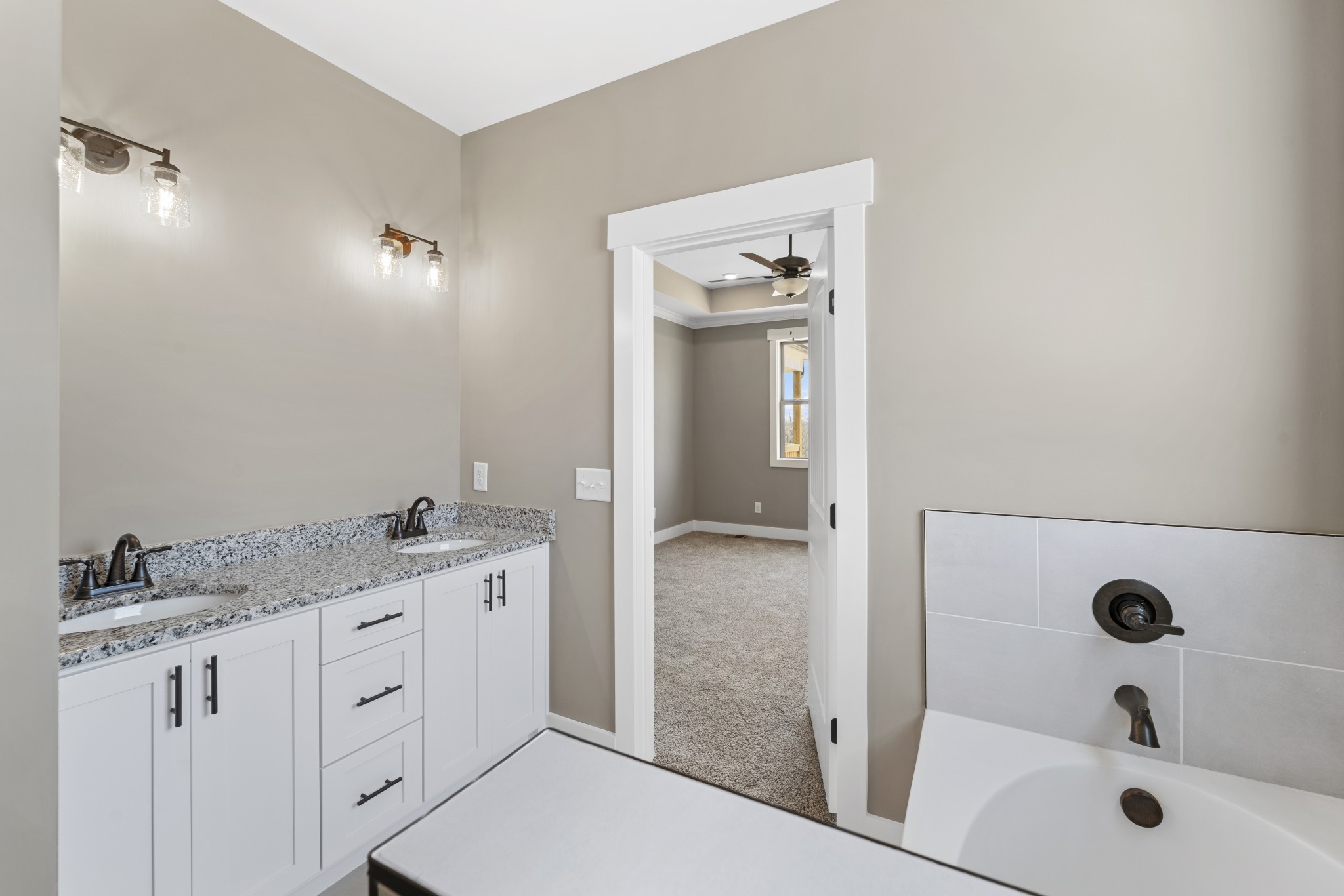 6120 Red River School Road Portland, TN 37148 - Photo 7 of 26 a bathroom with a granite countertop sink mirror and vanity