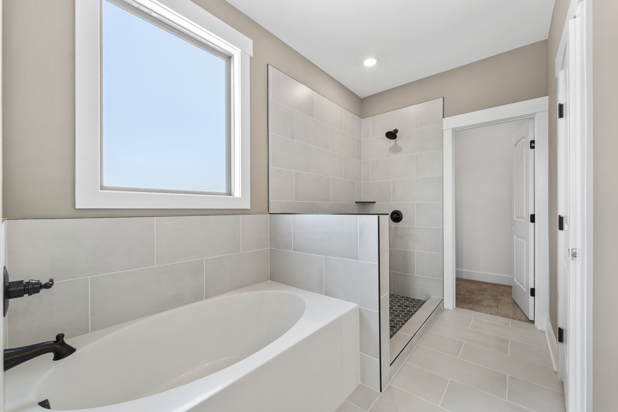 6120 Red River School Road Portland, TN 37148 - Photo 8 of 26 a bathroom with a bathtub and a shower