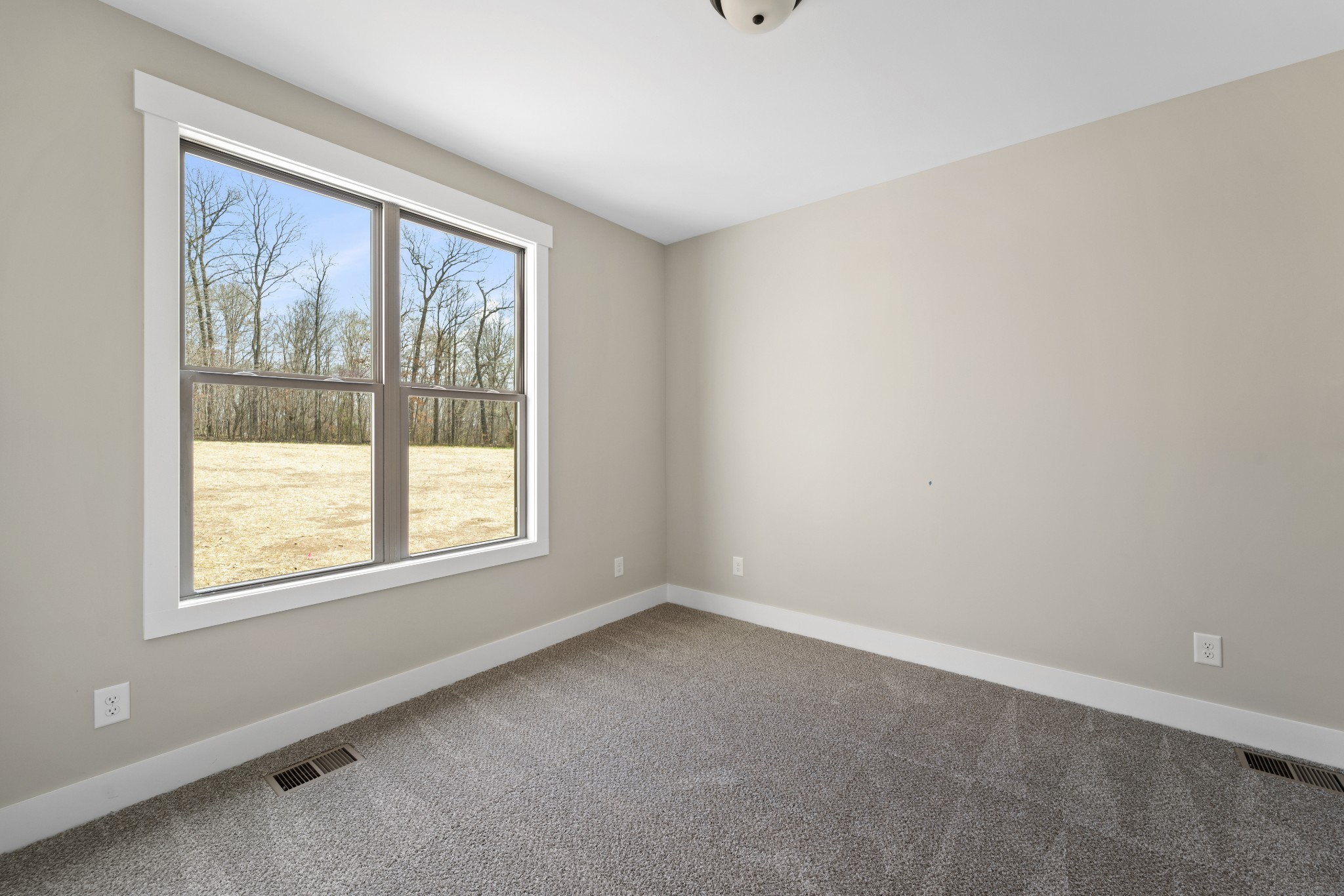 6120 Red River School Road Portland, TN 37148 - Photo 10 of 26 an empty room with a window