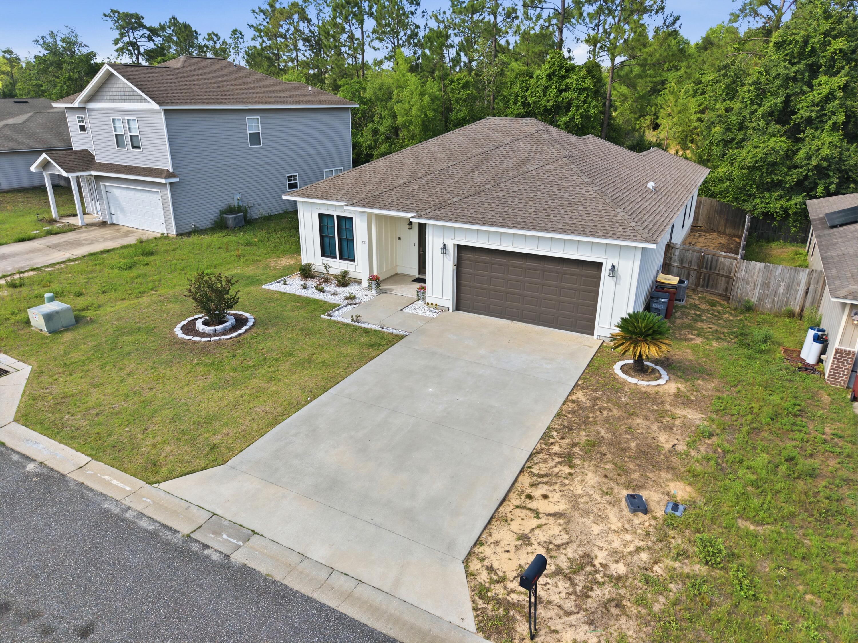 120 Lillian Way Crestview, FL 32536 - Photo 8 of 67 an aerial view of a house with yard