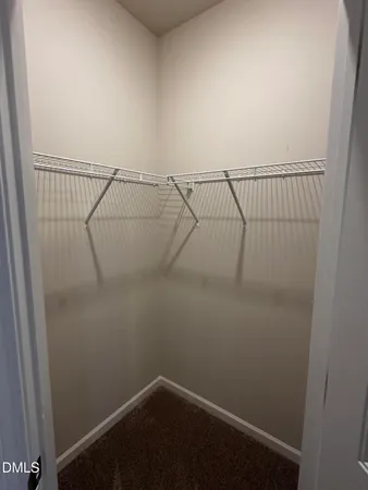 a view of small space with racks on the wall