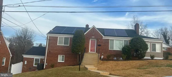 a brick house with a large windows