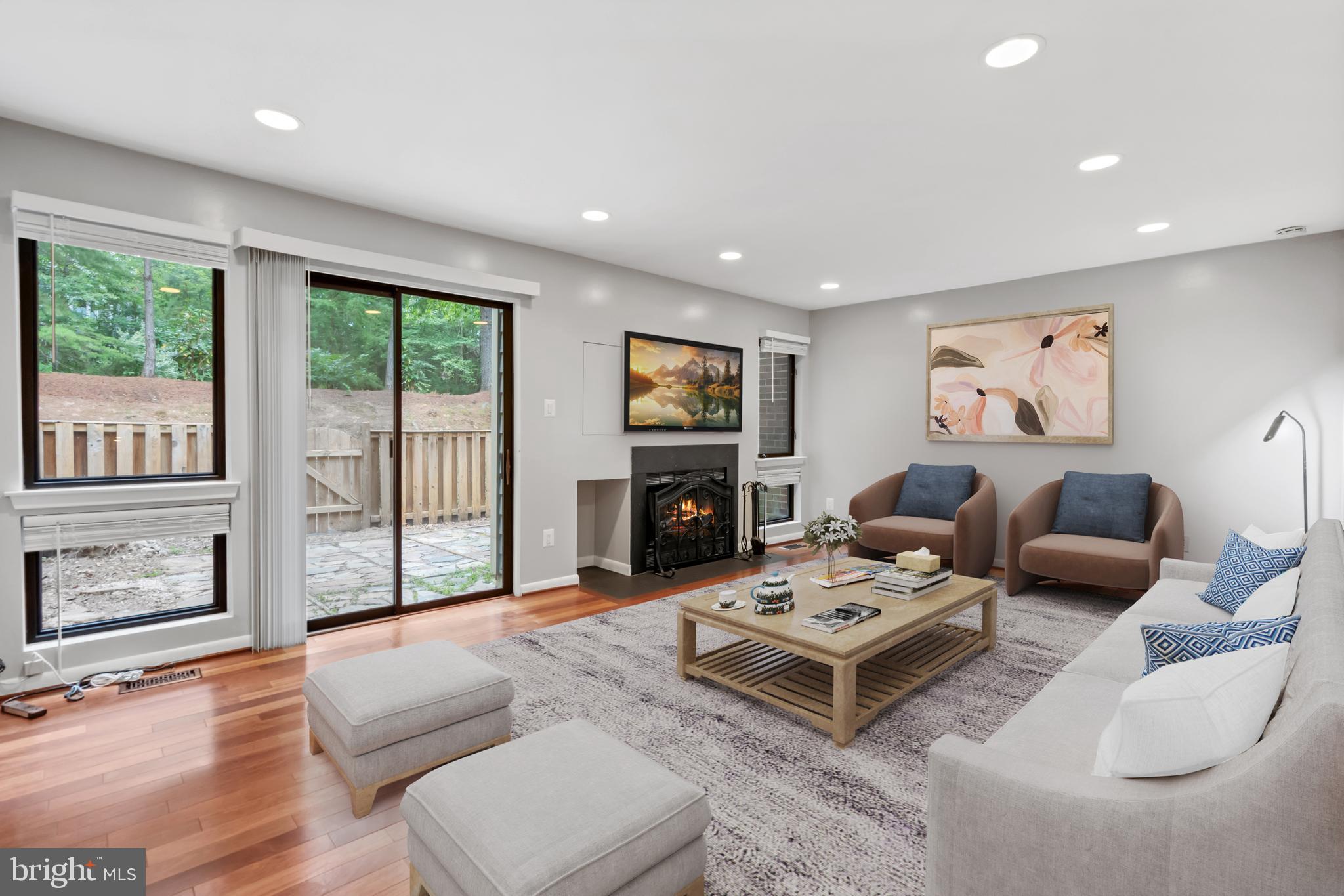 11019 Thrush Ridge Road Reston, VA 20191 - Photo 11 of 28 a living room with furniture and a fireplace