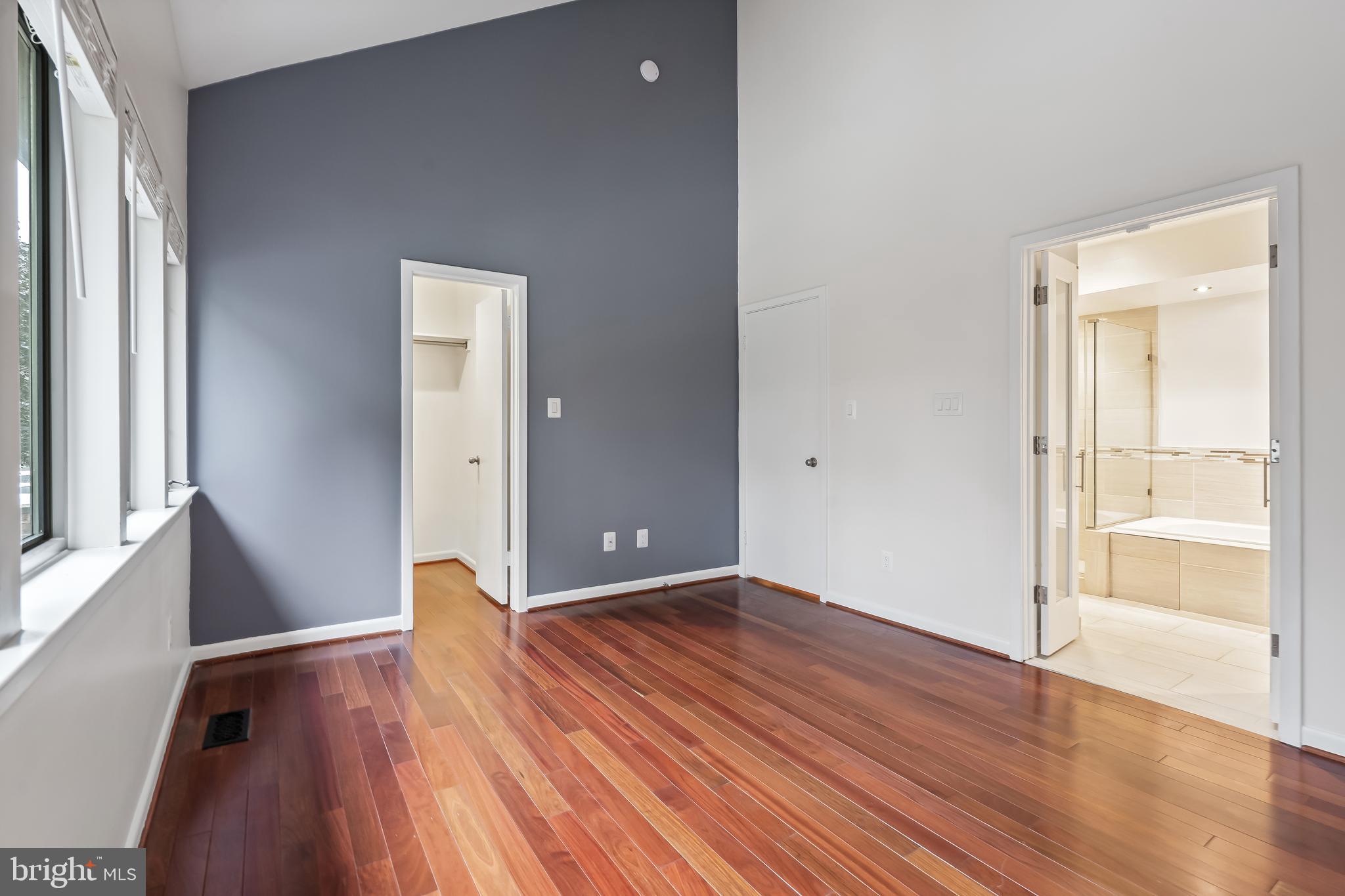 11019 Thrush Ridge Road Reston, VA 20191 - Photo 18 of 28 wooden floor in an empty room with a window