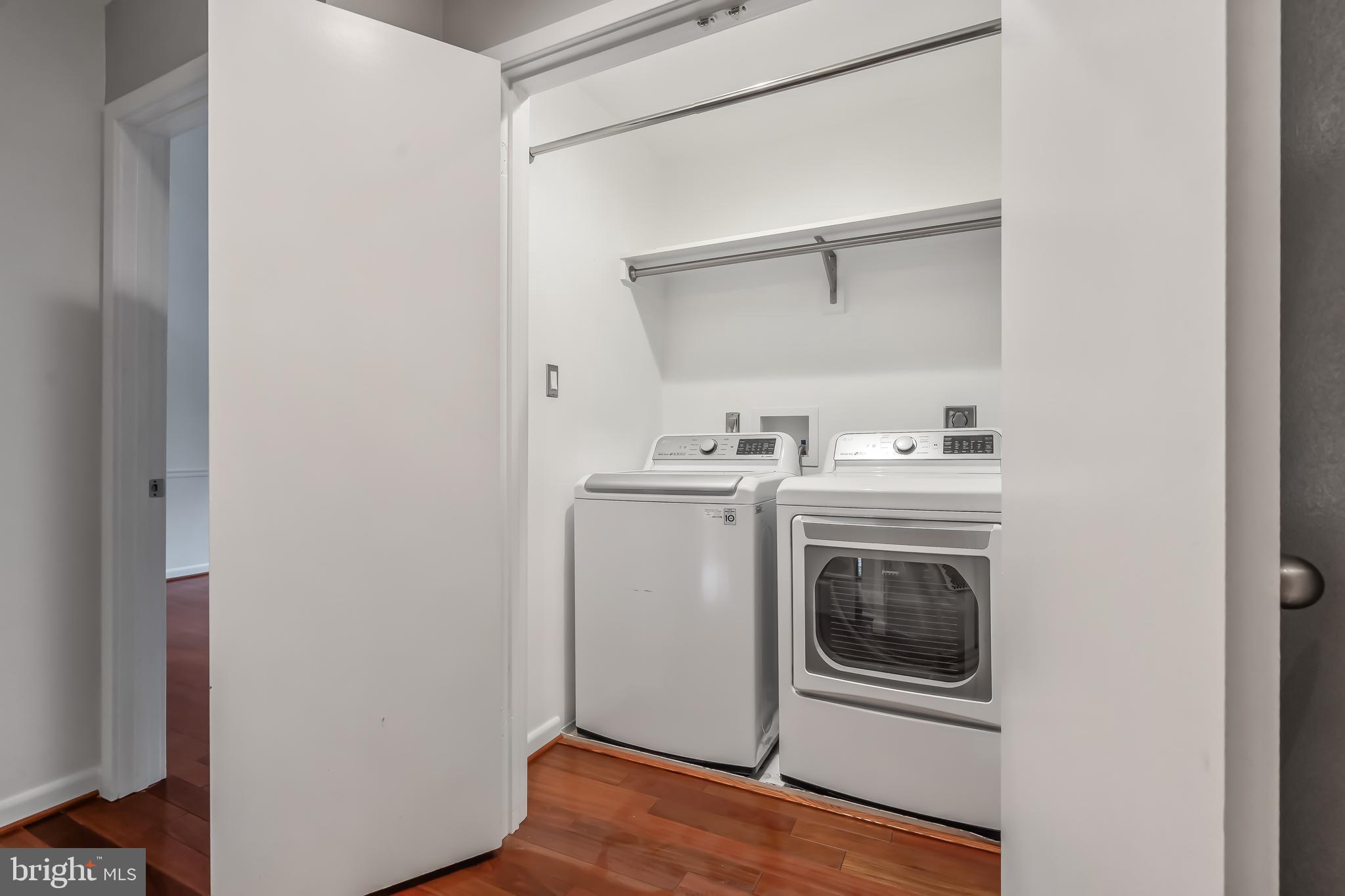 11019 Thrush Ridge Road Reston, VA 20191 - Photo 23 of 28 a utility room with dryer and washer