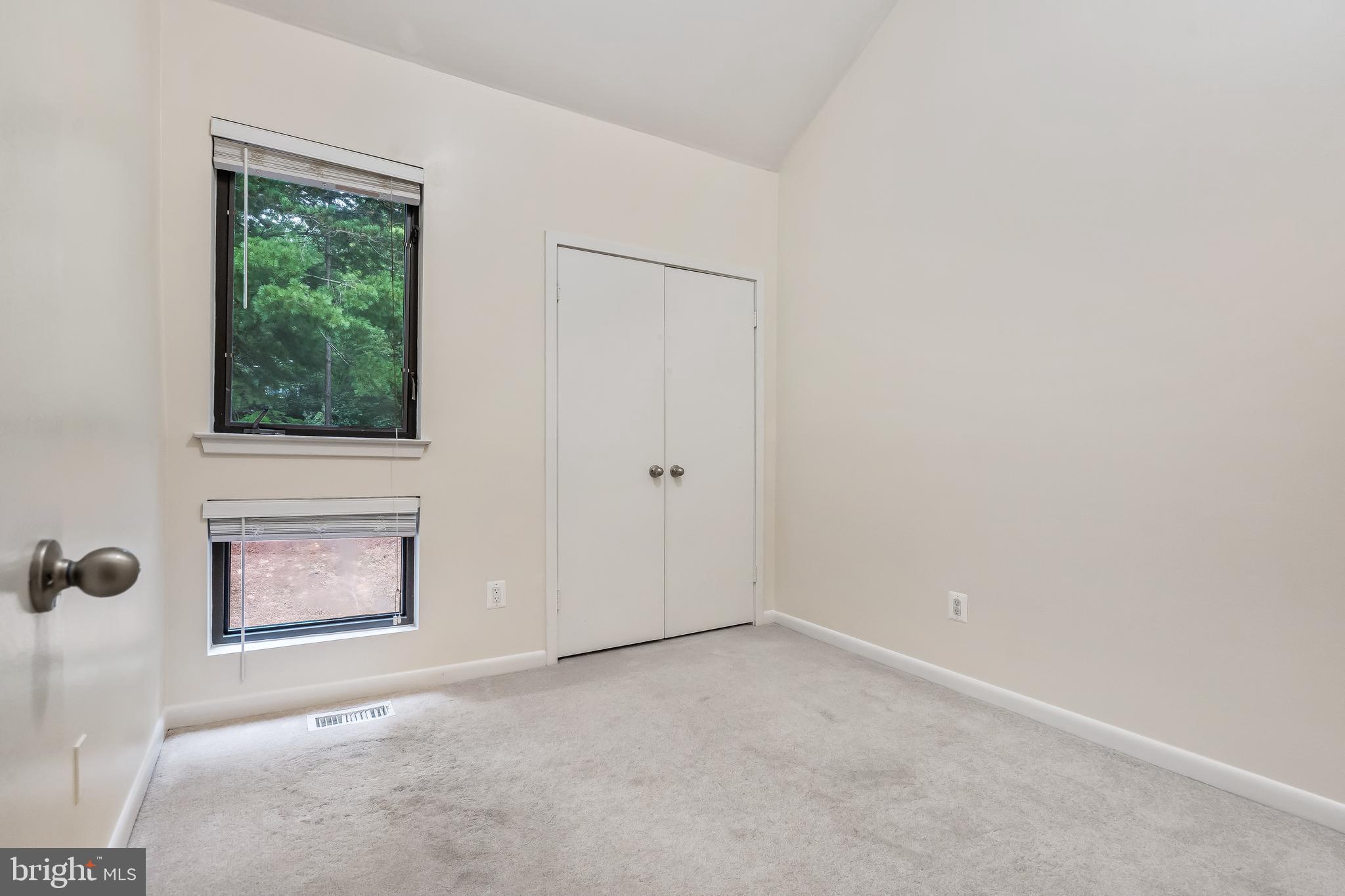 11019 Thrush Ridge Road Reston, VA 20191 - Photo 25 of 28 an empty room with windows and closet