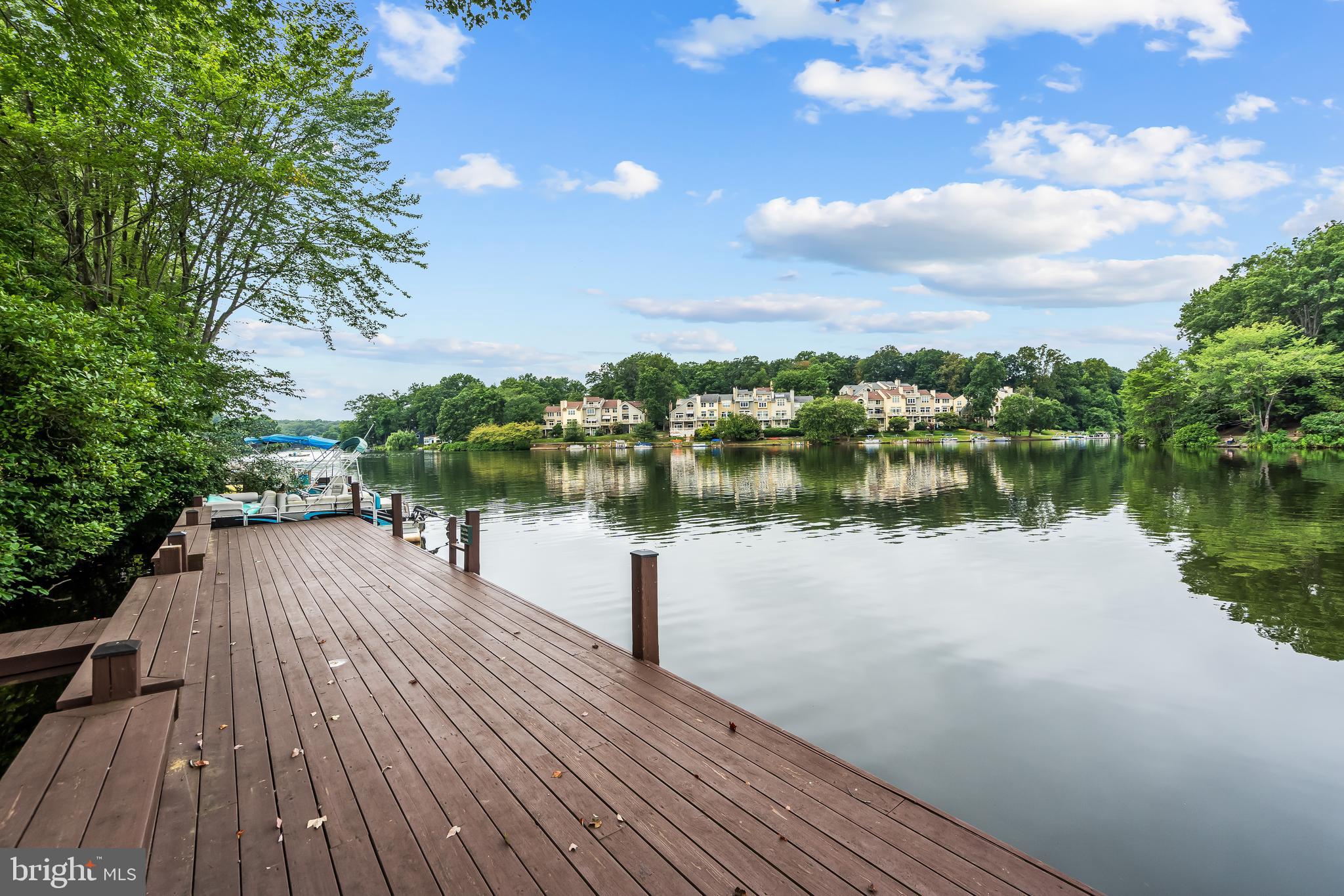 11019 Thrush Ridge Road Reston, VA 20191 - Photo 4 of 28 a wooden bridge near lake
