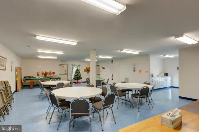 a view of a dining room with furniture