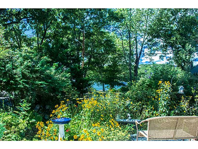 65 Woodsia Road Narragansett, RI 02874 - Photo 3 of 25 View. Front yard with direct waterview of the Narrow River