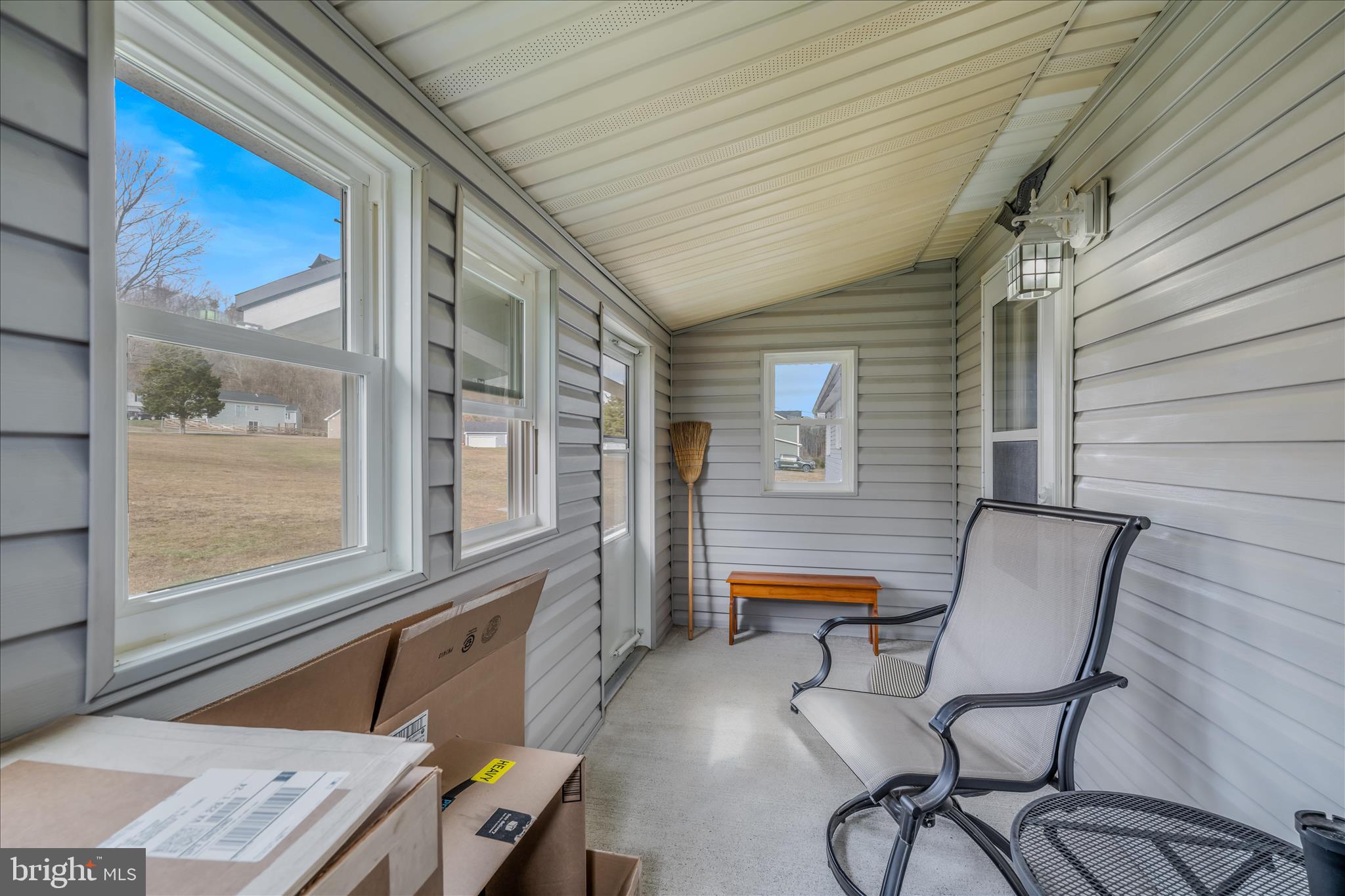 28 Gray Ridge Lane Berkeley Springs, WV 25411 - Photo 17 of 46 a balcony with with furniture and a window
