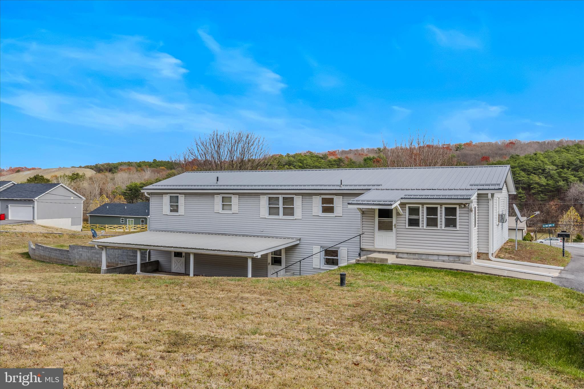 28 Gray Ridge Lane Berkeley Springs, WV 25411 - Photo 37 of 46 front view of a house with a yard