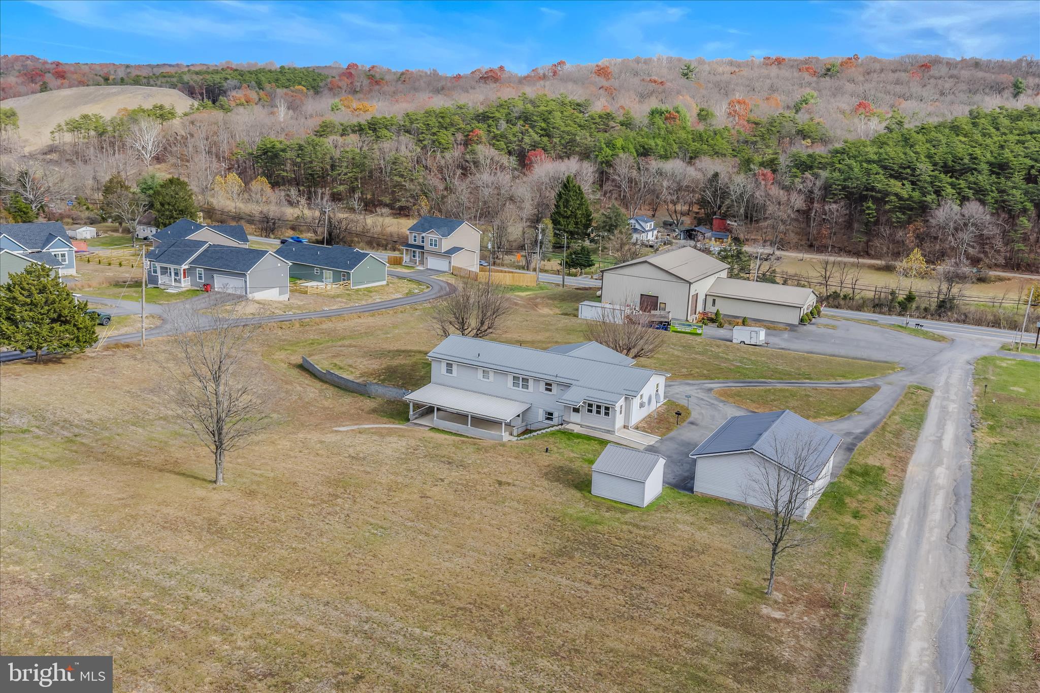 28 Gray Ridge Lane Berkeley Springs, WV 25411 - Photo 38 of 46 a view of a swimming pool with a table and chairs