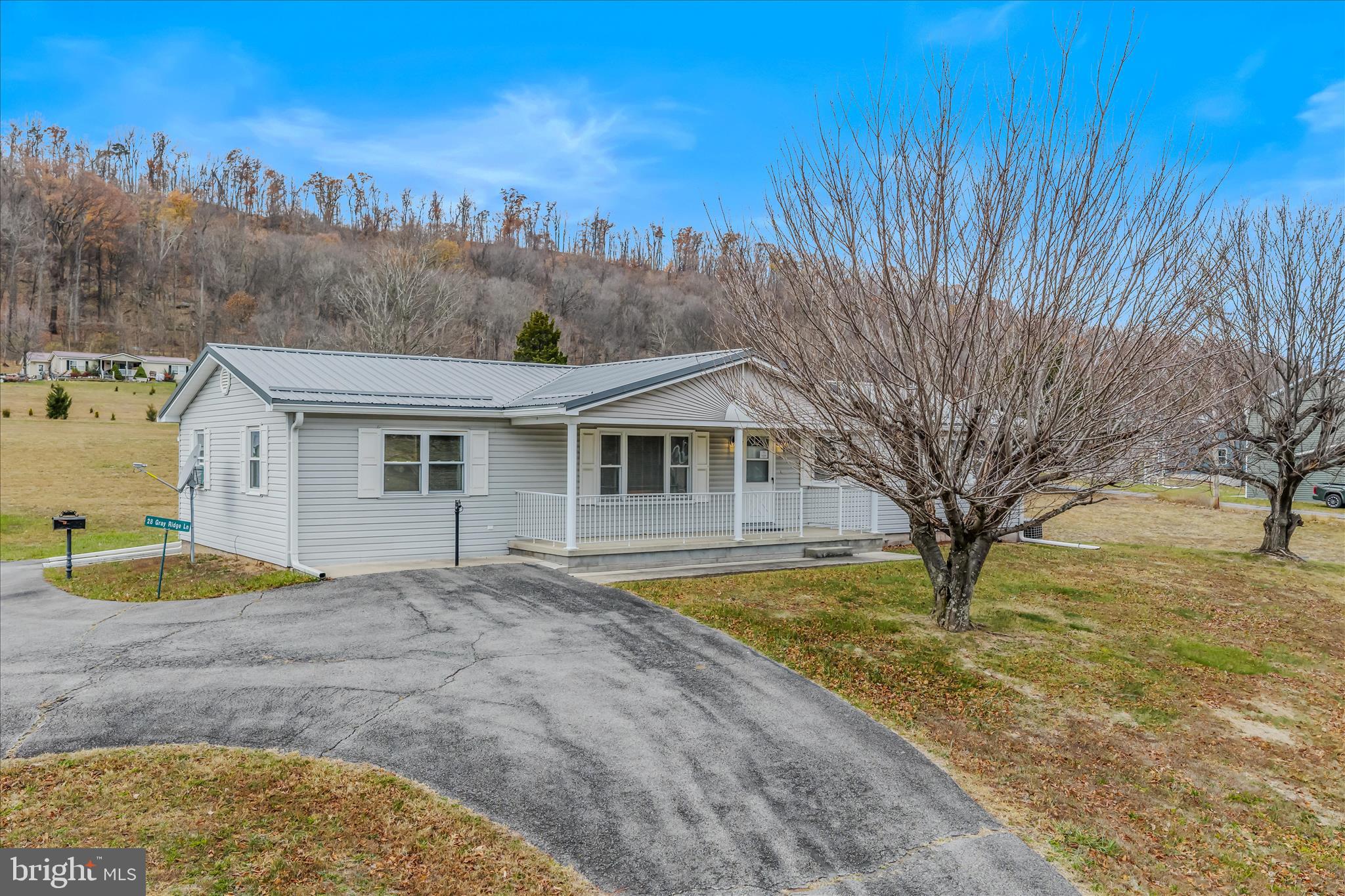 28 Gray Ridge Lane Berkeley Springs, WV 25411 - Photo 4 of 46 a view of a house with a yard