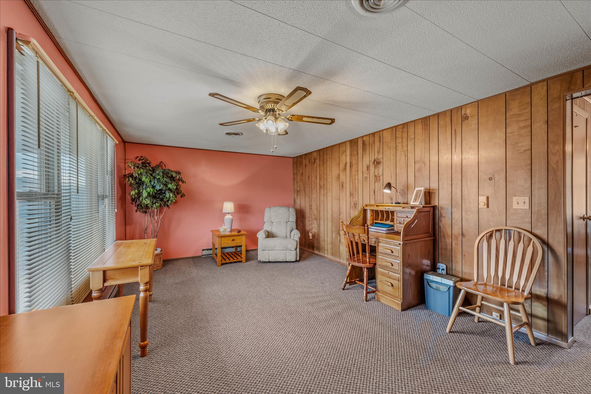 28 Gray Ridge Lane Berkeley Springs, WV 25411 - Photo 7 of 46 a view of a livingroom with furniture and a window