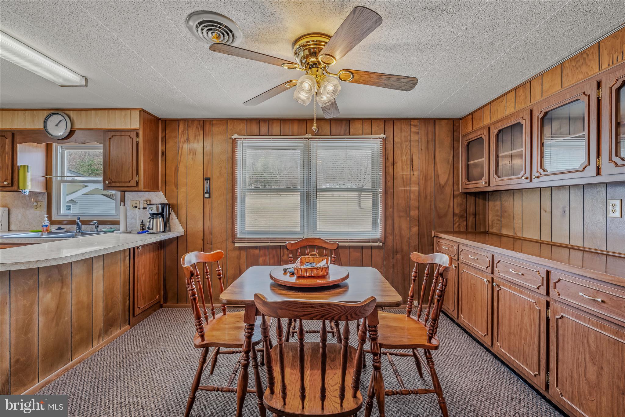 28 Gray Ridge Lane Berkeley Springs, WV 25411 - Photo 10 of 46 a dining room with furniture a window and chandelier