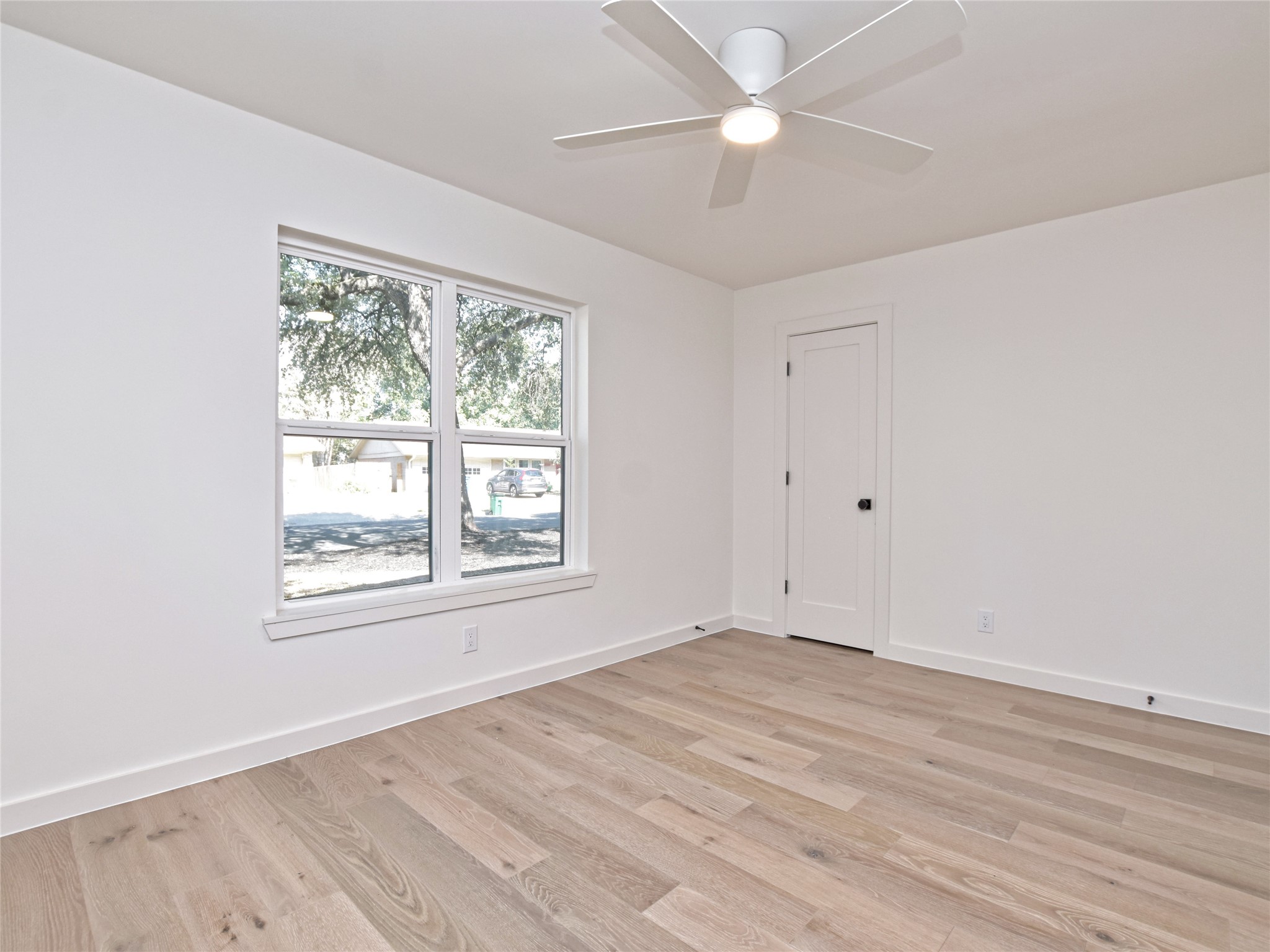 5903 Gateshead Drive Austin, TX 78745 - Photo 18 of 26 wooden floor in an empty room with a window