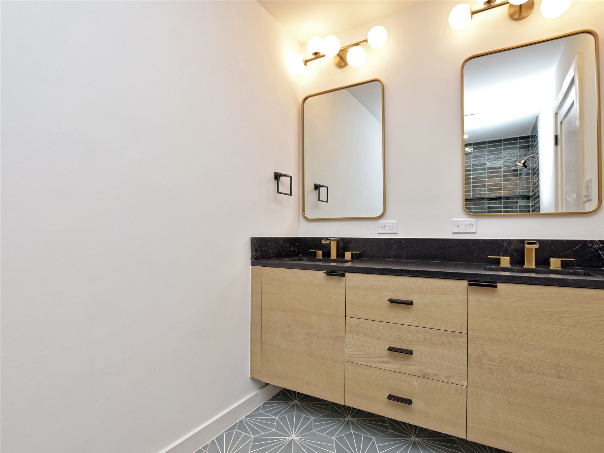 5903 Gateshead Drive Austin, TX 78745 - Photo 19 of 26 a bathroom with a sink and a mirror