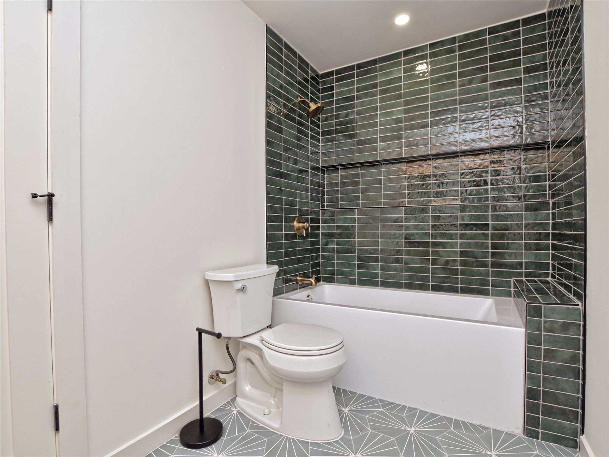 5903 Gateshead Drive Austin, TX 78745 - Photo 20 of 26 a bathroom with a toilet and a shower