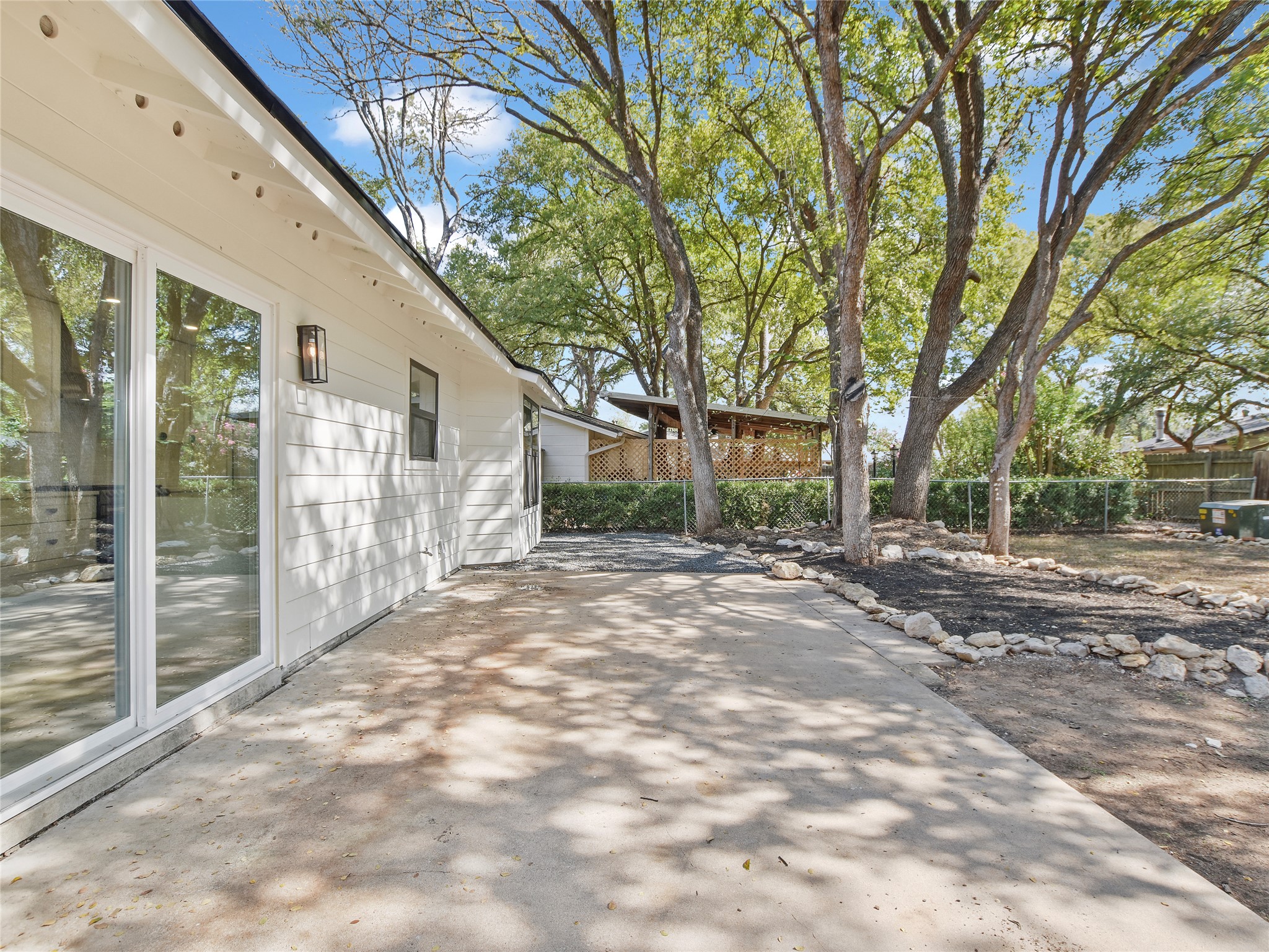 5903 Gateshead Drive Austin, TX 78745 - Photo 22 of 26 a view of a yard with a large tree