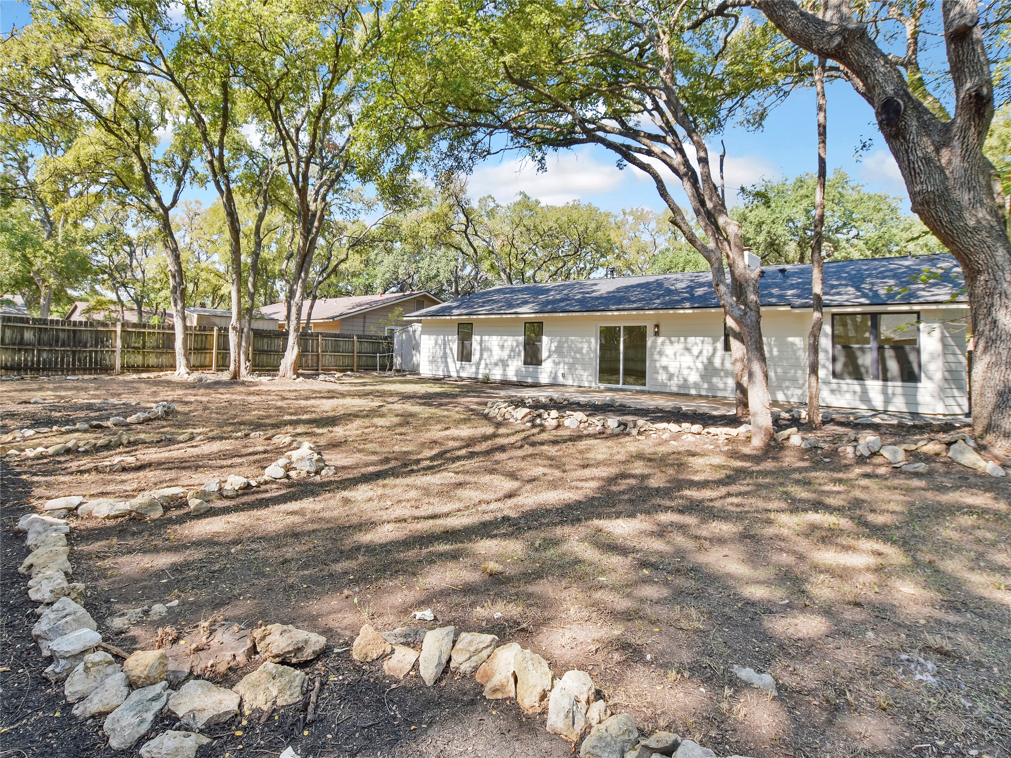 5903 Gateshead Drive Austin, TX 78745 - Photo 25 of 26 front view of a house with a yard