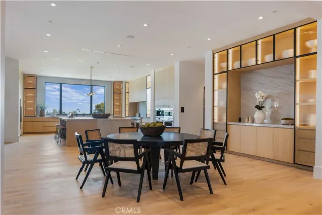 a view of a dining room with furniture and a livingroom