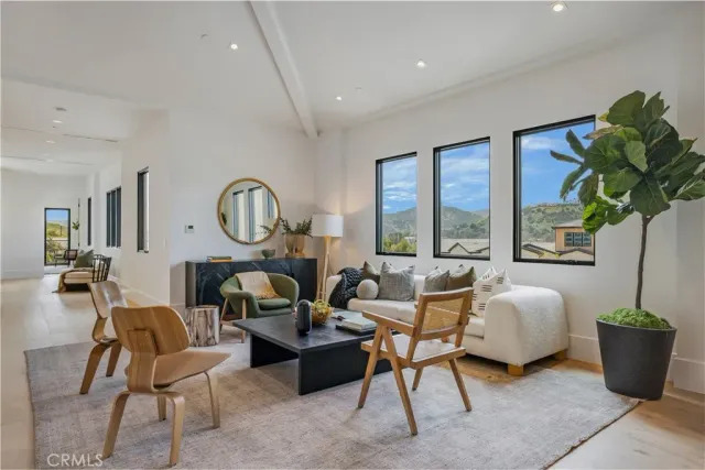 a view of a livingroom with gym equipment