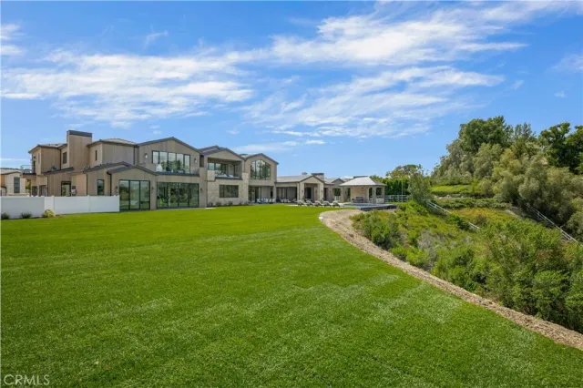 a view of a house with a big yard